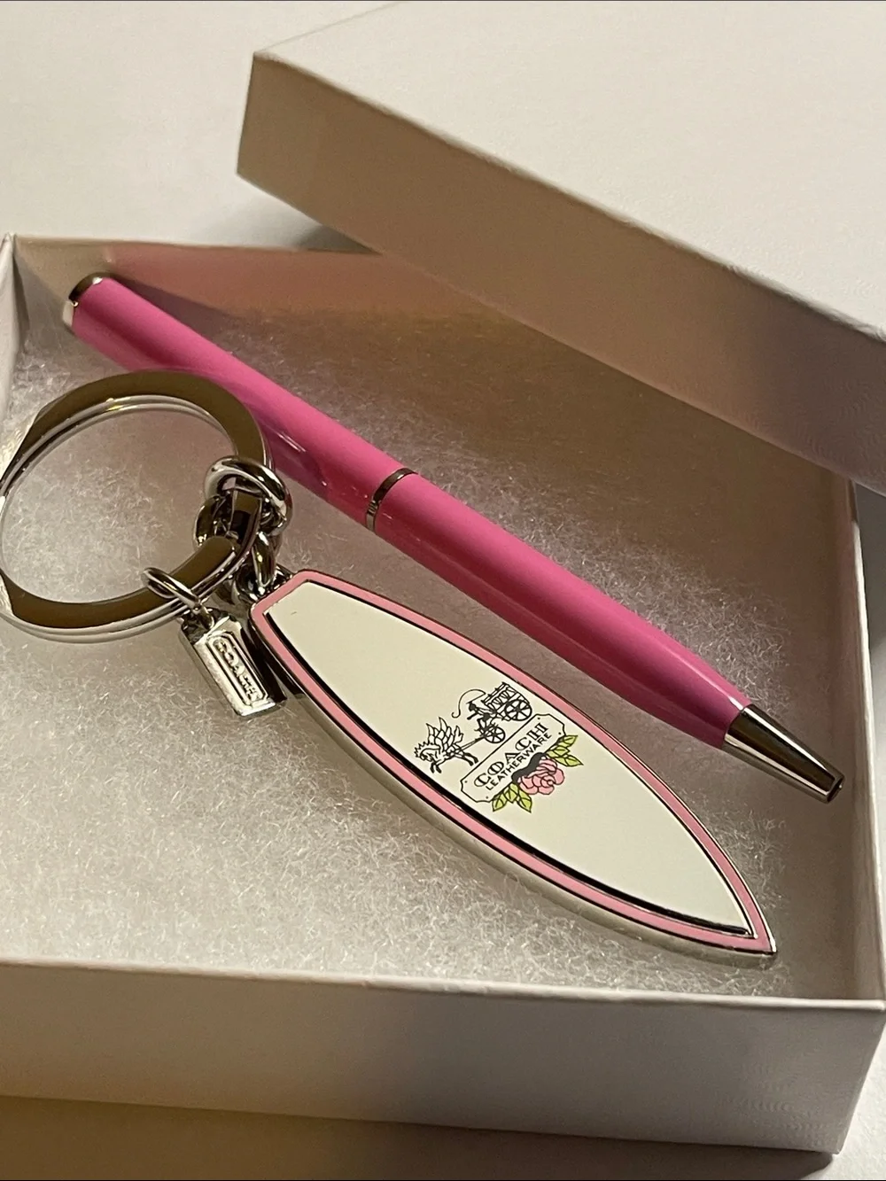 Coach Surfboard Keychain in Pink and Cream and Pink Coach Pen